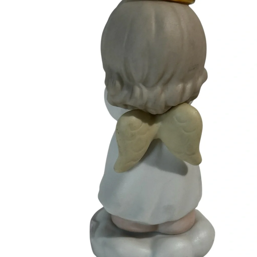 Precious Moments March Angel Figurine - White and Cream