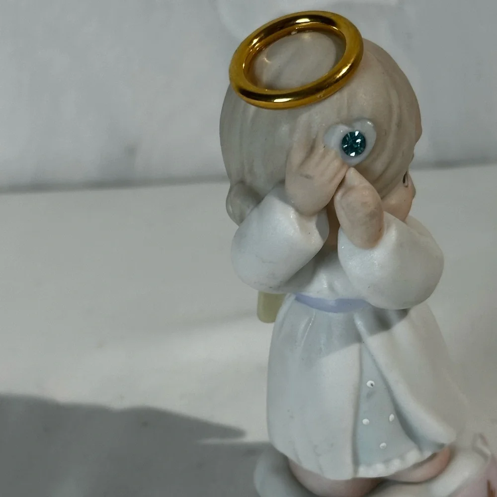 Precious Moments March Angel Figurine - White and Cream