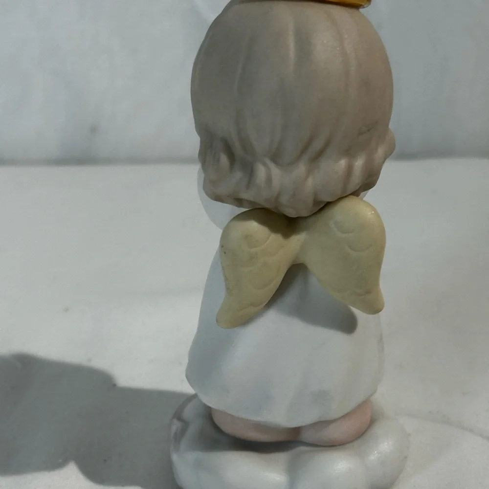 Precious Moments March Angel Figurine - White and Cream