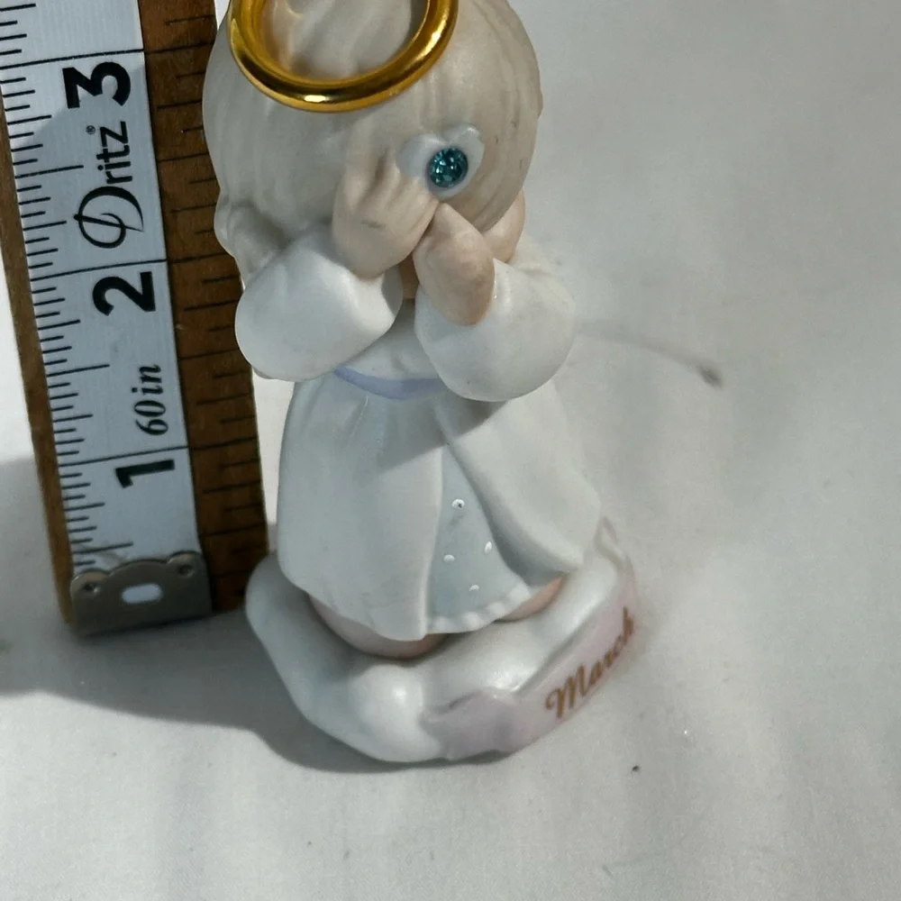 Precious Moments March Angel Figurine - White and Cream