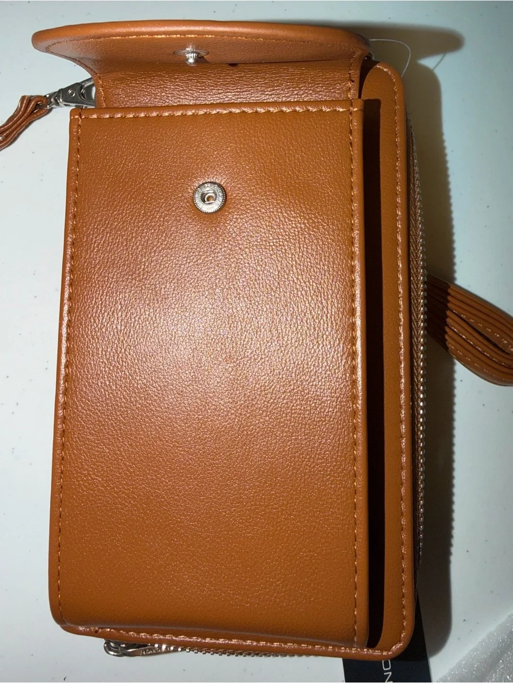 French Connection Athena Smooth Phone Crossbody Wristlet  Cognac