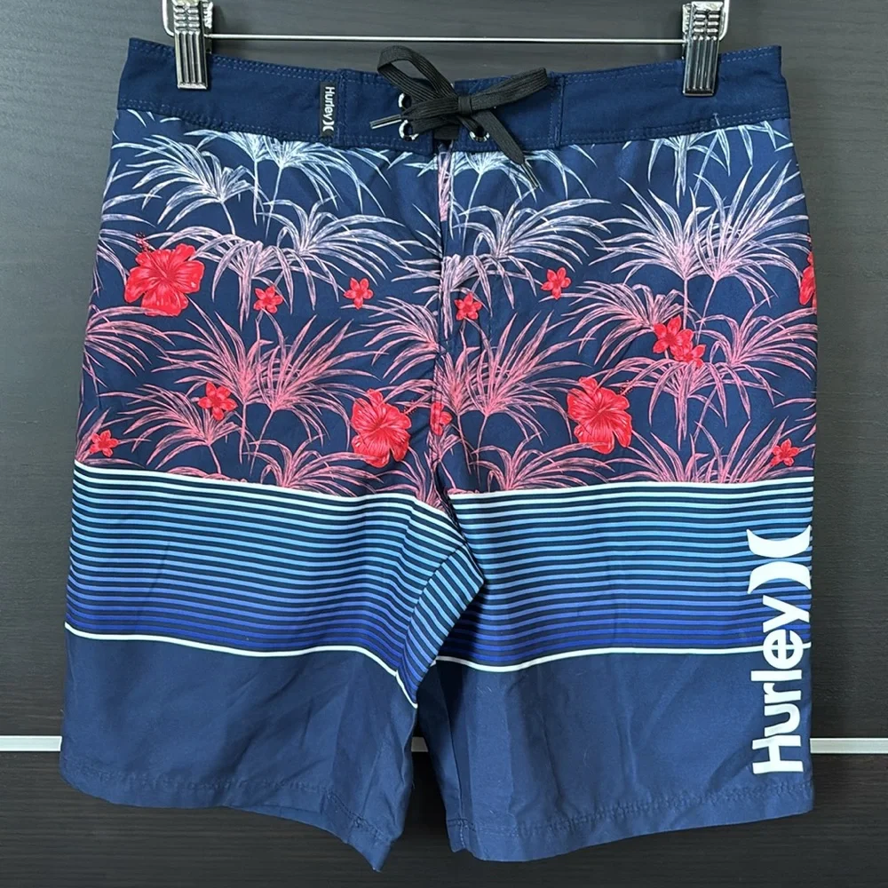 Hurley Boy’s Blue and Red Board Shorts with Tropical Design