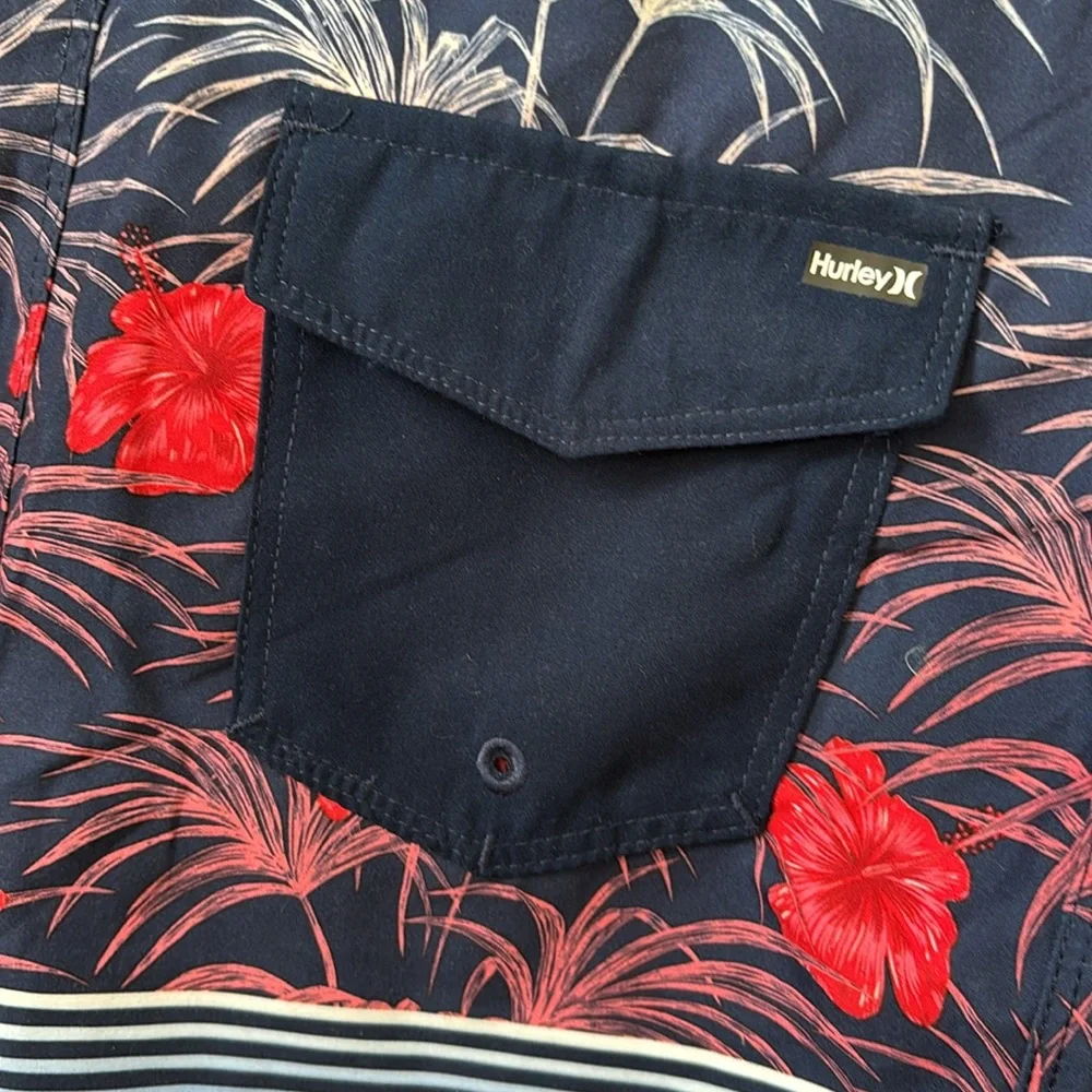 Hurley Boy’s Blue and Red Board Shorts with Tropical Design