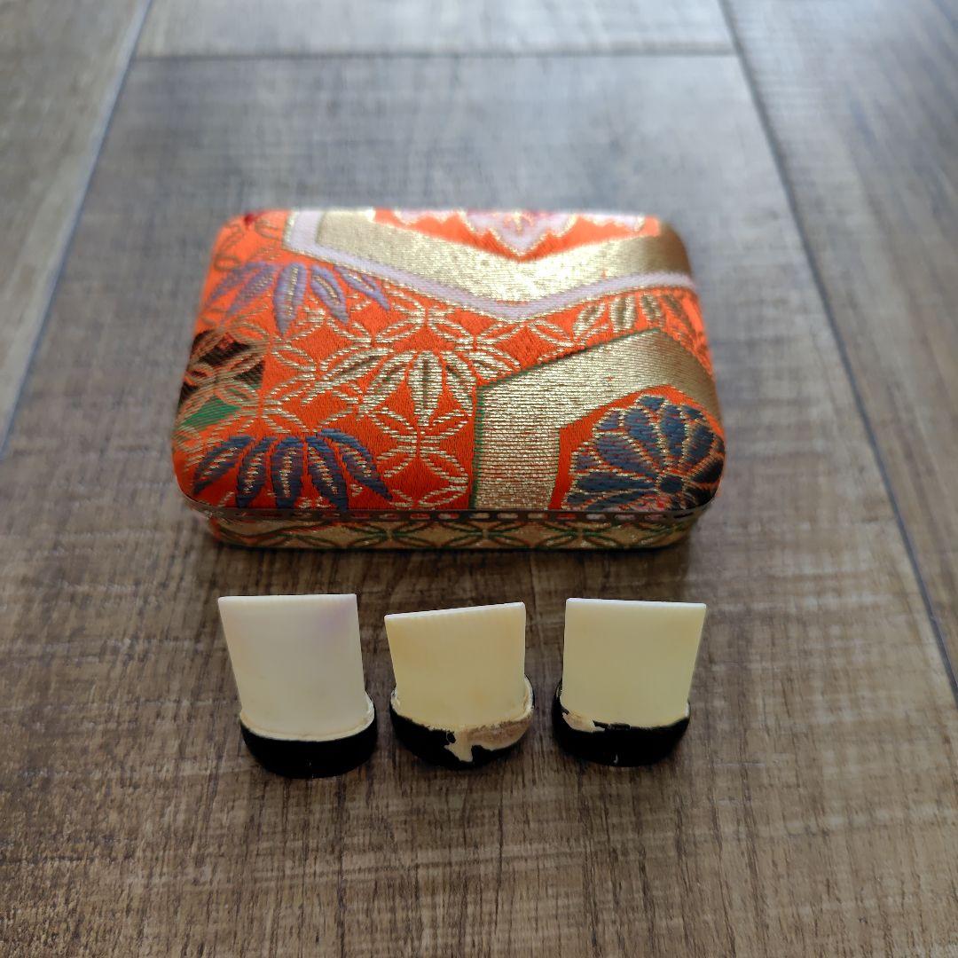 Case with orange pattern for Koto and 3 Koto picks