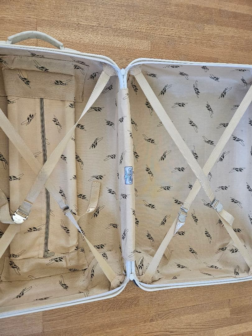 RIMOWA White Hardshell Suitcase